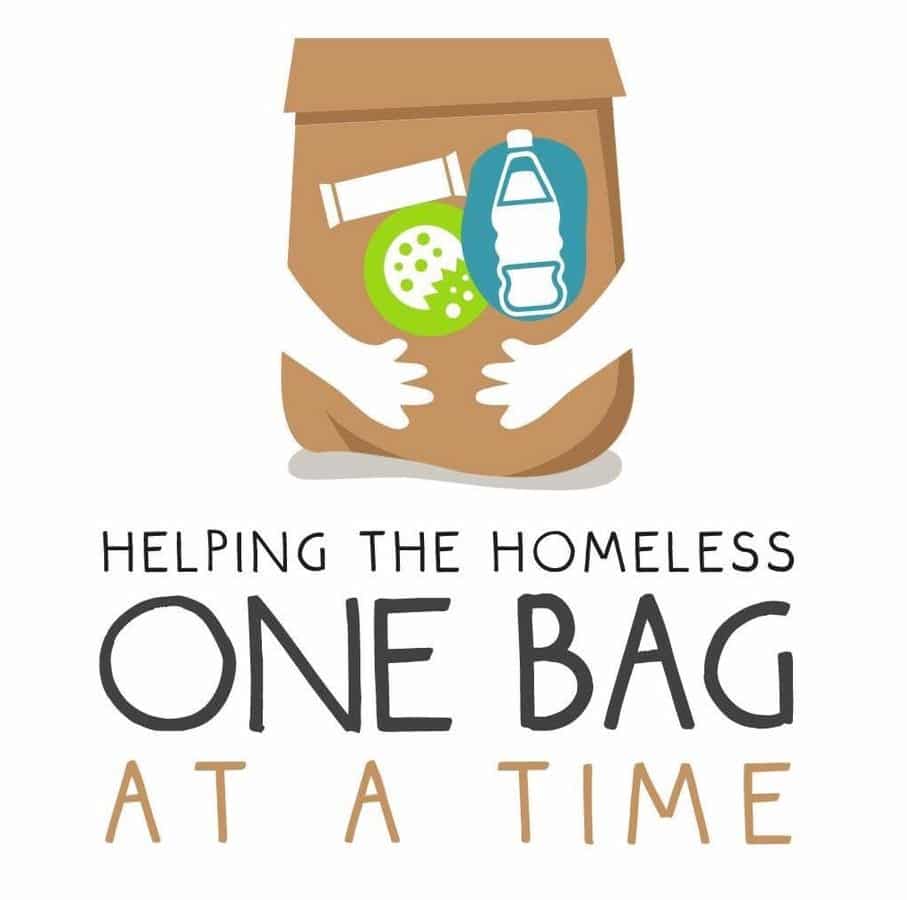 Illustration of a paper bag with food, water, and toiletries, with text: "Helping the Homeless One Bag at a Time.