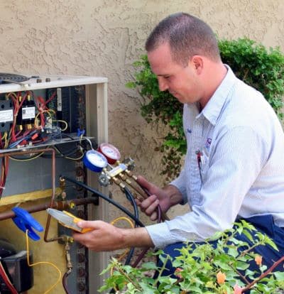 Tech Repairing Hvac