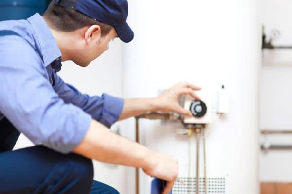 Technician Checking Water Heater